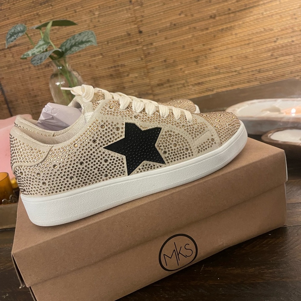 NWT box sparkle sneakers. Super cute. Never worn. she has outgrown them